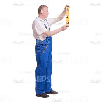Cutout Photo of Middle-aged Builder Standing Sideways and Holding a Level Tube Vertically-0