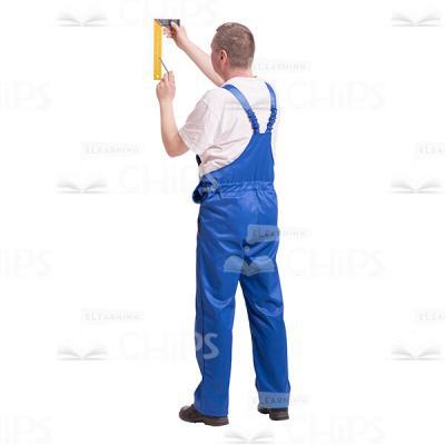 Cutout Image of Middle-aged Builder Standing His Back and Drawing a Line with a Ruler-0