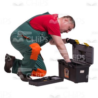 Middle-aged Repairman Searching Into The Instrument Box Cutout Picture-0