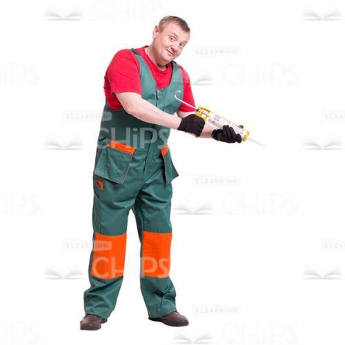 Smiling Middle-aged Repairman Using The Cartridge Gun Cutout Picture-0