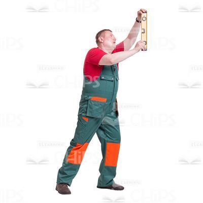 Middle-aged Repairman Using The Bubble Level Cutout Picture-0