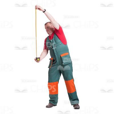 Middle-aged Repairman Measuring With The Tape-measure Cutout Picture-0