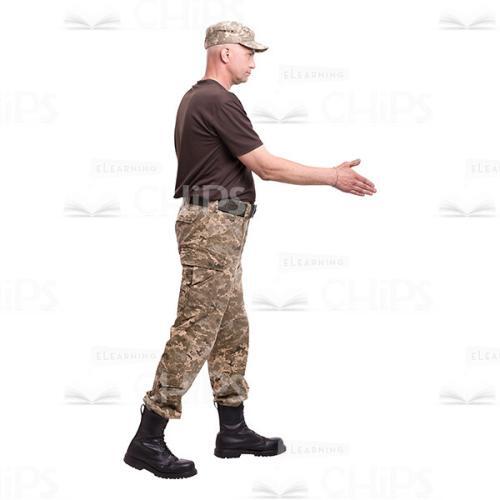Walking And Gritting Mid-Aged Soldier Profile View Cutout Photo-0