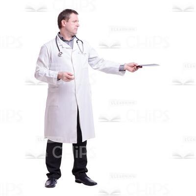 Cutout Photo of Middle-aged Doctor Standing Half-turned and Extending X-rays with His Left Hand-0
