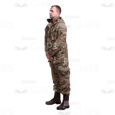 Calm Crossed Hands Standing Young Soldier In The Camouflage Cutout Photo-0