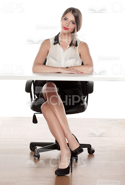 Nice Business Woman Sitting At Table Stock Photo Pack-31936