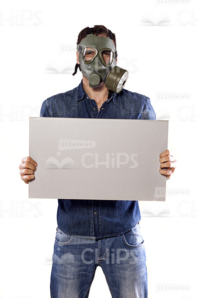 Man Is Gas Mask Holding White Board Stock Photo-0