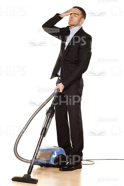 Young Business Man Using Vacuum Cleaner Stock Photo Pack-32030