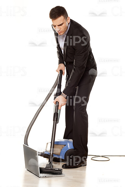 Young Business Man Using Vacuum Cleaner Stock Photo Pack-32031