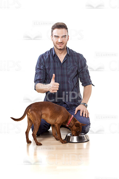 Handsome Young Man Playing With Dog Stock Photo Pack-32083
