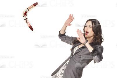 Frightened Woman Defending Herself From Boomerang Stock Photo Pack-32153