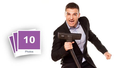 Young Business Man Using Vacuum Cleaner Stock Photo Pack-0