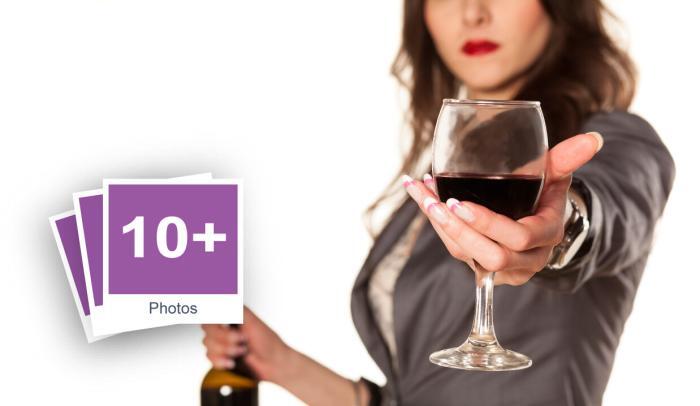 Pretty Young Housewife Drinking Wine Stock Photo Pack-0