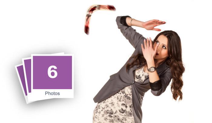 Frightened Woman Defending Herself From Boomerang Stock Photo Pack-0