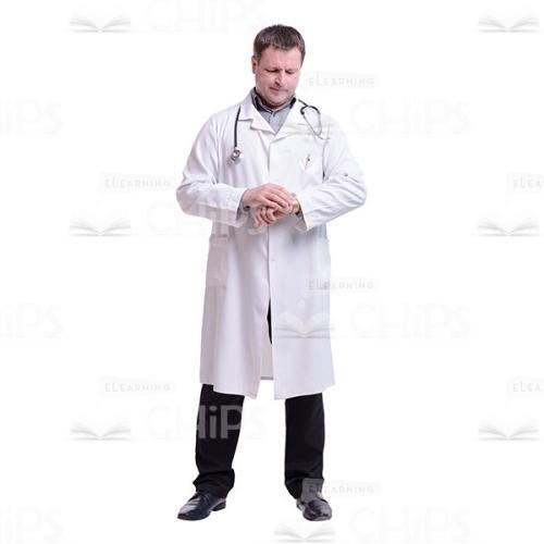 Doctor Looking At His Wrist-Watch Cutout Photo-0