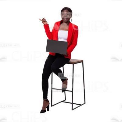 Excited Businesswoman Sitting On High Chair With Notebook Image Cutout-0
