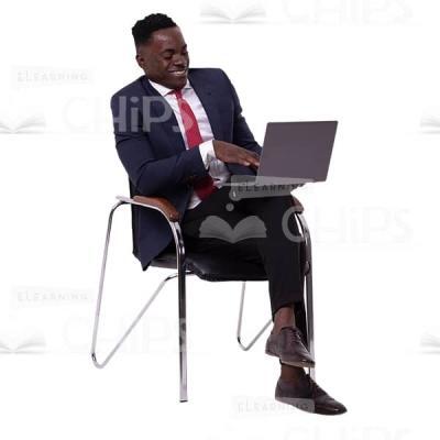 Joyful Businessman Sitting In Front Of The Laptop Cutout Picture-0
