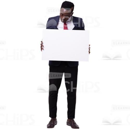 Business Man Holding White Banner And Looks At It Cutout Photo-0