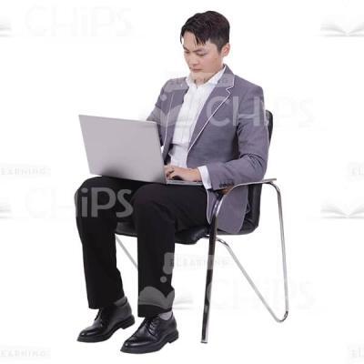 Young Man Sitting On Chair Working With Notebook Photo Cutout-0