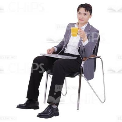 Handsome Businessman Sitting with Laptop and Holding Cup Cutout Photo-0