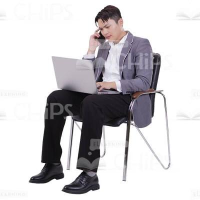 Asian Businessman Sitting and Talking on Phone Cutout Picture-0