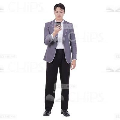 Serious Asian Man Reading Message In Smartphone Picture Cutout-0