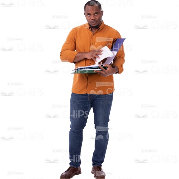 American Male Turns Pages In Folder Focused At Front Cutout Photo-0