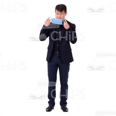 Asian Businessman Preparing To Wear A Medical Mask Cutout Photo-0