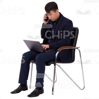 Concentrated Cutout Man Sitting On Chair With Phone And Laptop-0